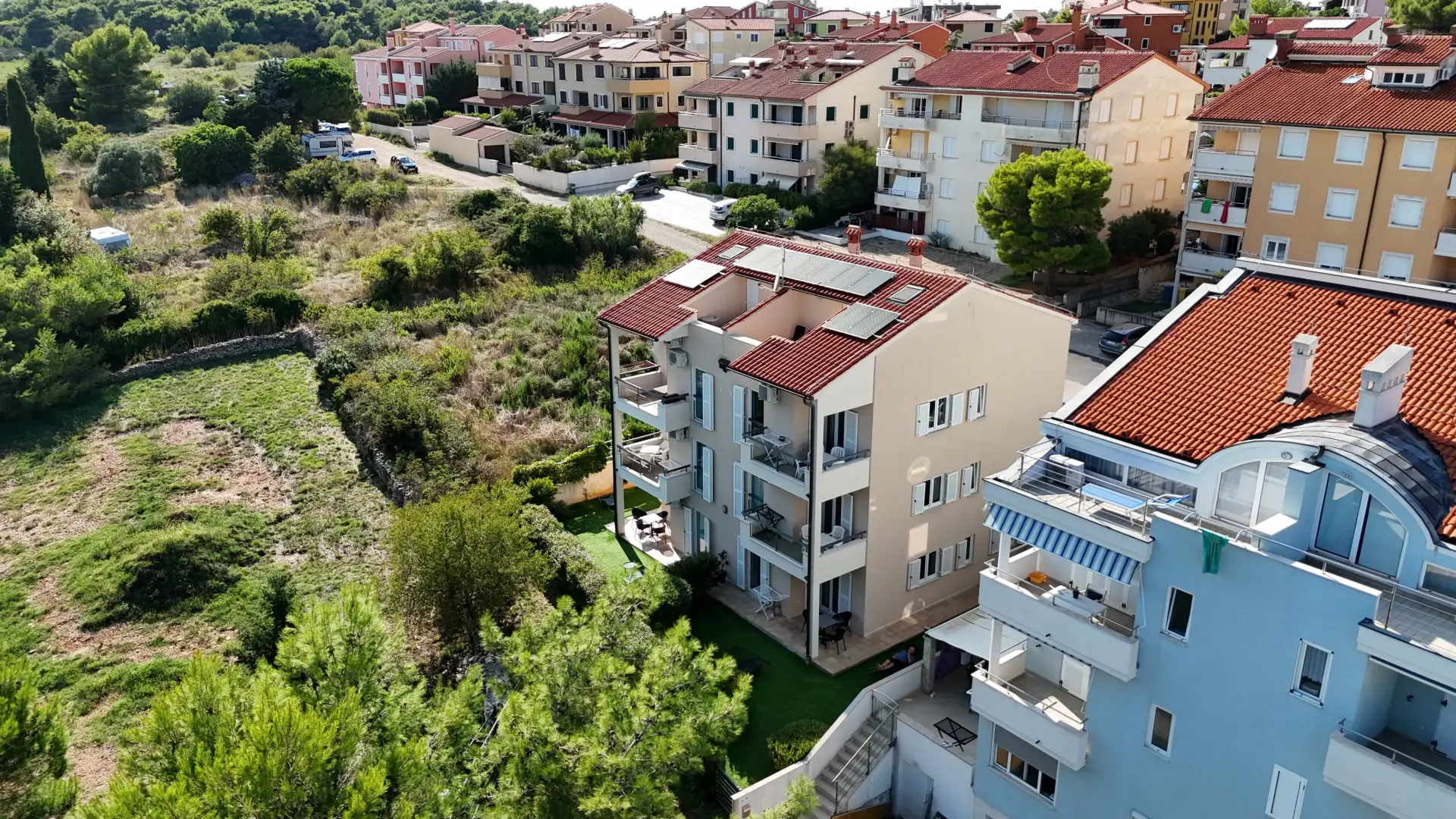 Aerial drone view of Apartments Punta Premantura building